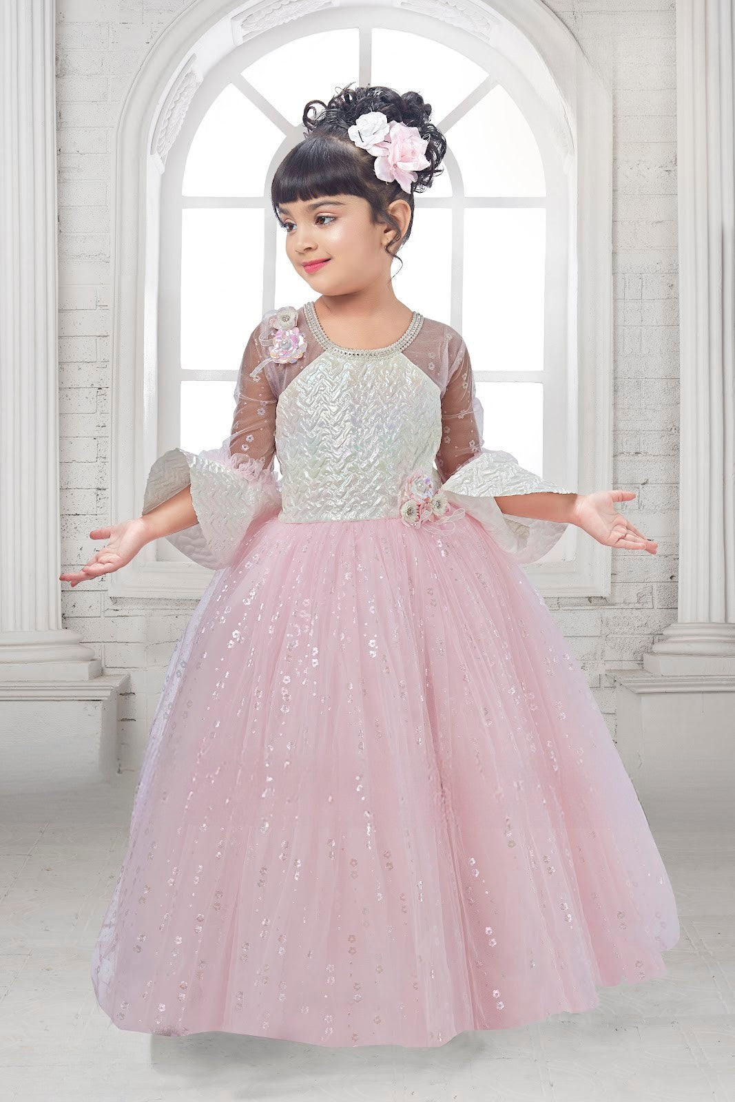 Pastel Pink Sequined Ball Gown with Iridescent Bodice & Sheer Sleeves