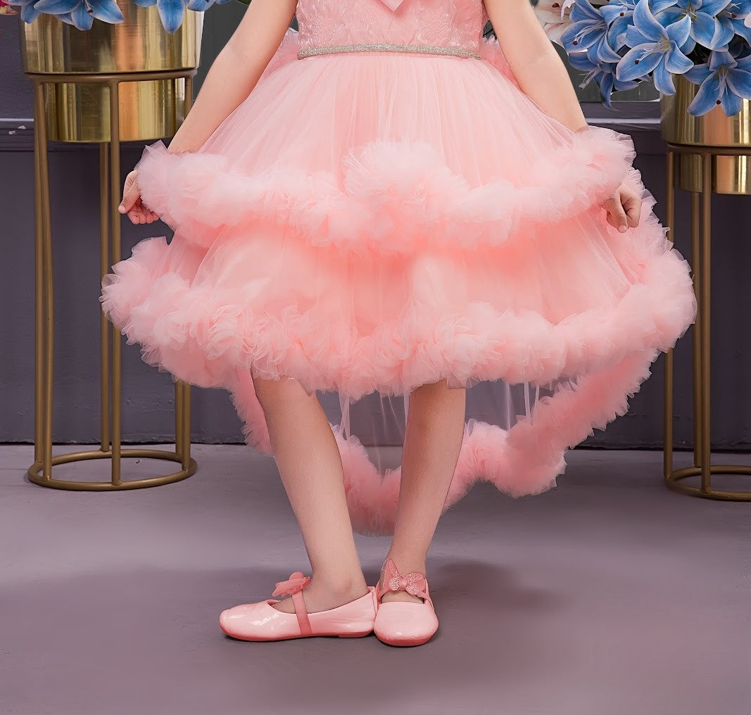 Peach Girls’ Hi-Low Net Ruffle Gown with Shoulder Bow