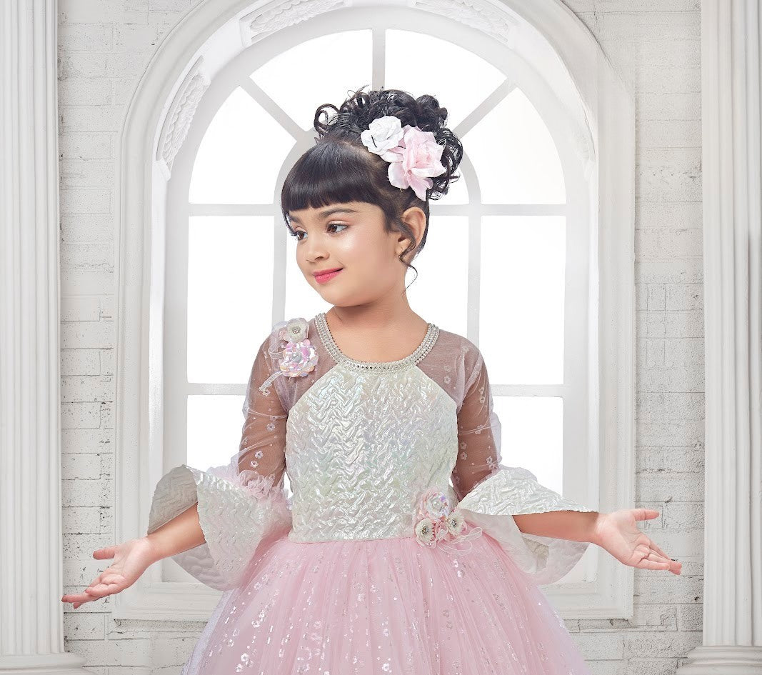 Pastel Pink Sequined Ball Gown with Iridescent Bodice & Sheer Sleeves